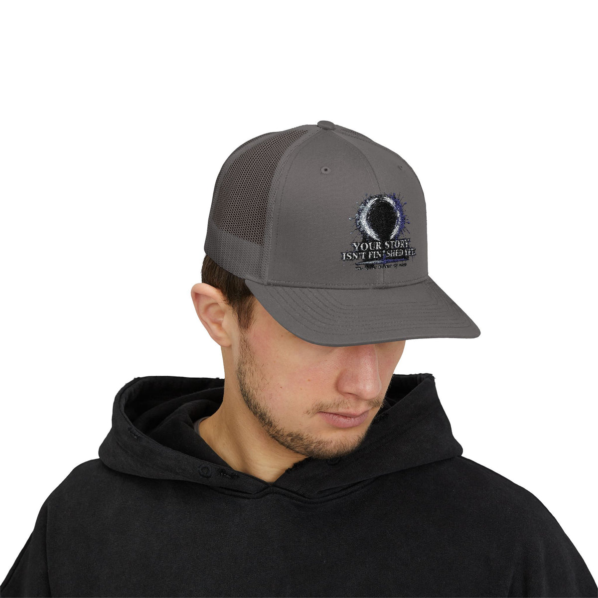 Abstract Sunburst with Quote Trucker Cap | Your Story Isn’t Finished Yet