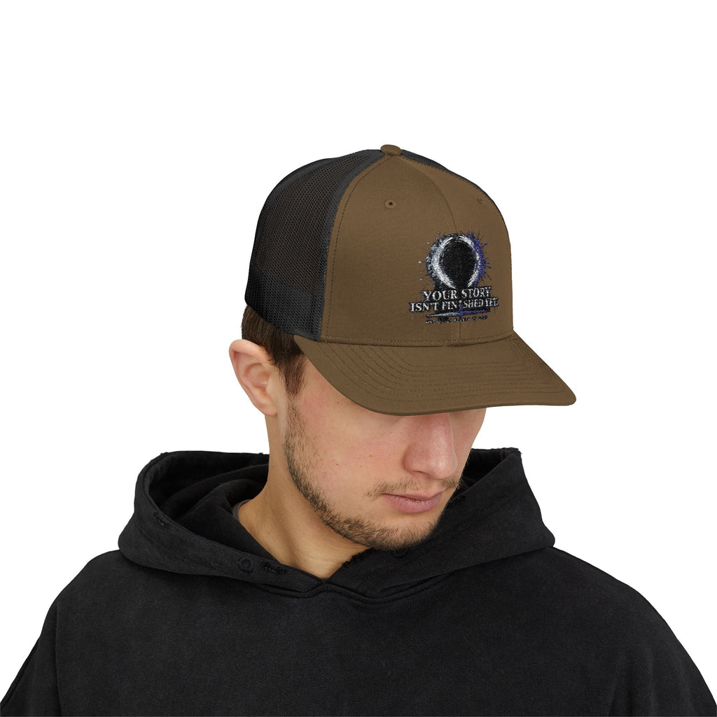 Abstract Sunburst with Quote Trucker Cap | Your Story Isn’t Finished Yet