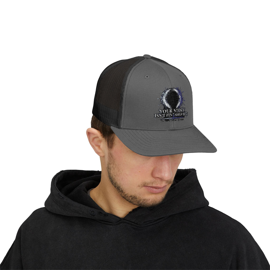Abstract Sunburst with Quote Trucker Cap | Your Story Isn’t Finished Yet